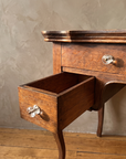 Antique writing desk, open drawer detail
