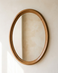 The Amber Oval Mirror