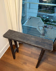 Ebonized reclaimed wood console, angled view