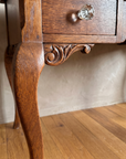 Antique writing desk, cabriole leg and carved bracket detail