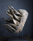 Senufo sacrifice mask, Ivory Coast, profile detail of the encrusted carved surface