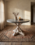 The Patina Zinc Trestle Table styled in a warm room