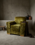 Olive velvet channel-arm club chair, lifestyle hero