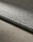 Macro detail of the tight rolled selvedge edge