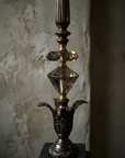 Macro detail of the two faceted smoked crystals, beaded bronze knop and cast acanthus leaf cup