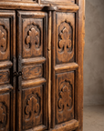 Macro detail of the cabinet doors and iron hasp, alternate angle