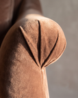 Detail of the rolled arm fan-pleat construction on the Taylor King sofa