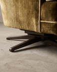 Detail of the dark bronze swivel-rocker metal base