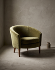 Dialogica barrel chair three-quarter view showing form and construction