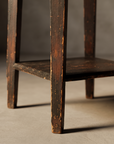 Close up detail of the tapered legs and square lower shelf construction