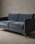 Smoked slate velvet track-arm sofa, 45 degree three-quarter view
