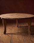 Antique round coffee table, lighter, three-quarter view