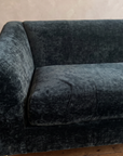 Close-up of the peacock crushed chenille, flared arm and bench cushion