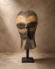 Carved Mask with Ochre Pigment