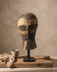 Carved Mask with Ochre Pigment