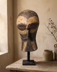 Carved Mask with Ochre Pigment