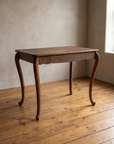 Three-quarter view from the right of the oak writing desk