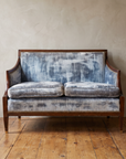 Ice blue velvet loveseat, front view