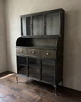 Gunmetal steel hutch at a 45 degree angle showing the curved side gallery and depth