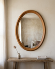 The Amber Oval Mirror