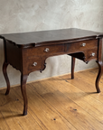 Antique serpentine writing desk, hero view, dark wood with cabriole legs
