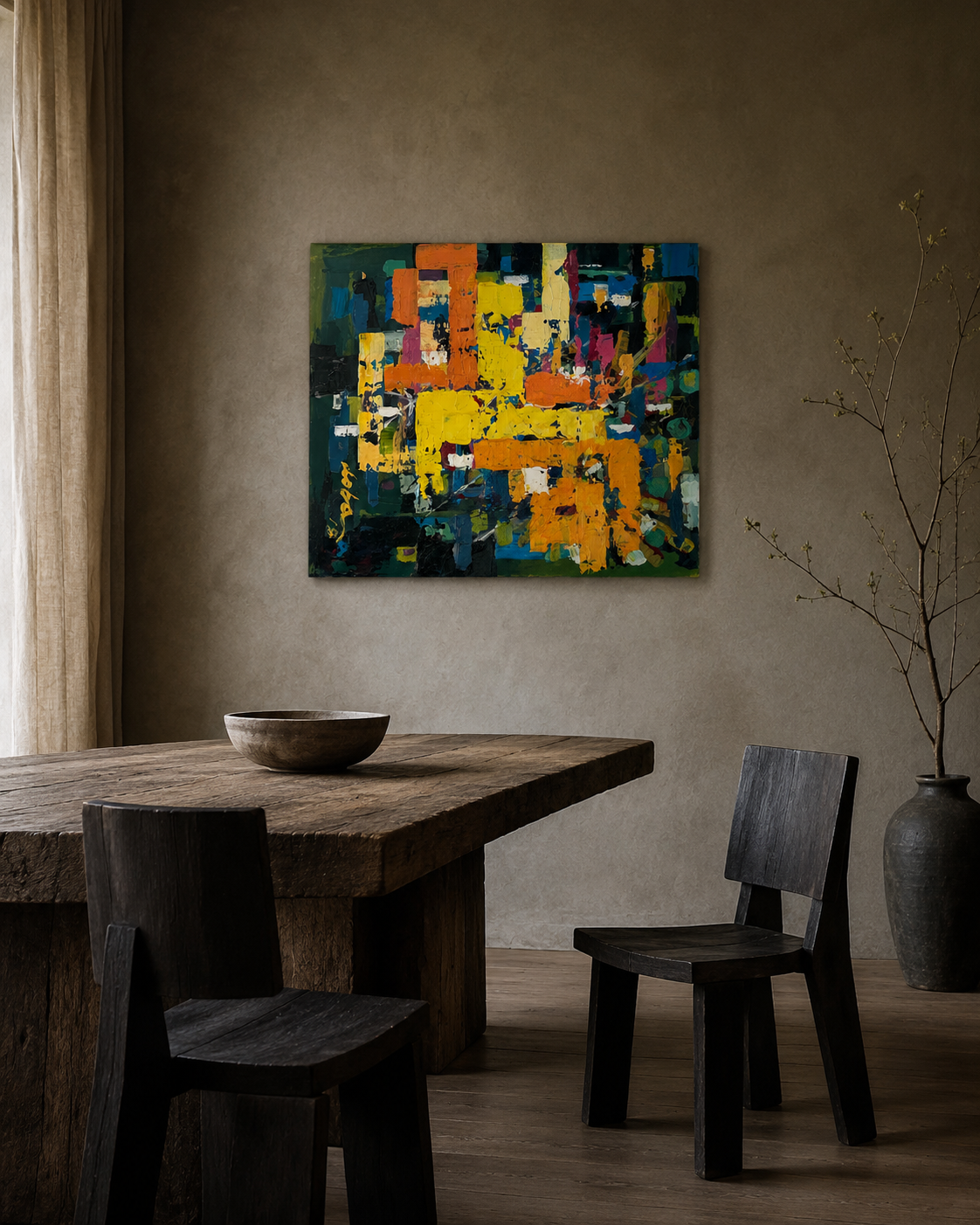 Yellow and green textured abstract painting above a rustic wood dining table in a warm plaster room