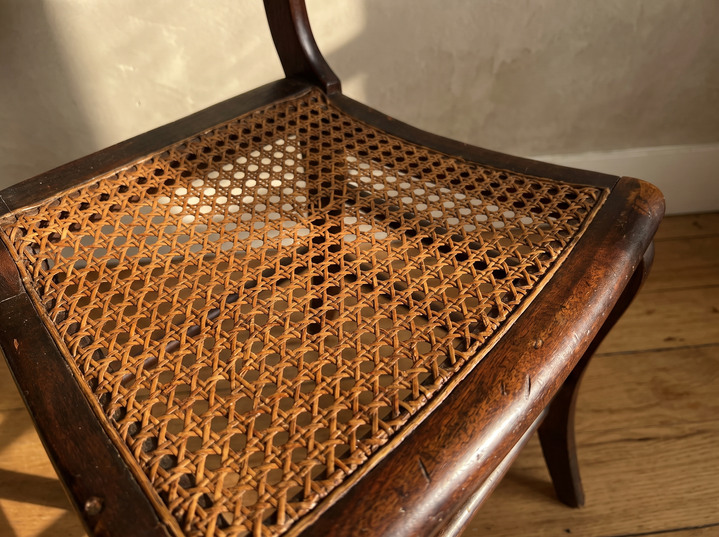 Antique cane seat chair, cane weave detail