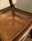 Antique cane seat chair, cane weave detail
