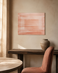 Warmth hung above a dark wood console in a warm plaster dining room