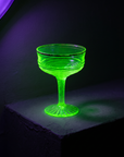Gold-Rim Swirl Coupe, uranium glass, fluorescing green under UV blacklight