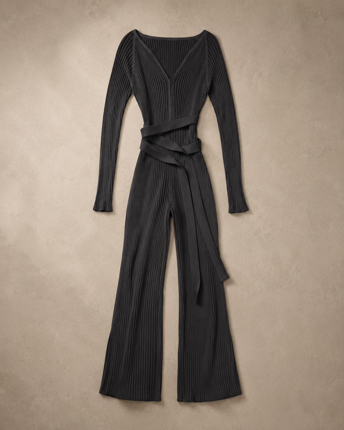 Black Ribbed Wrap Jumpsuit laid flat, long sleeves, deep V neck, tie waist and wide legs