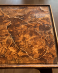 Macro detail of the oyster-cut burl walnut top