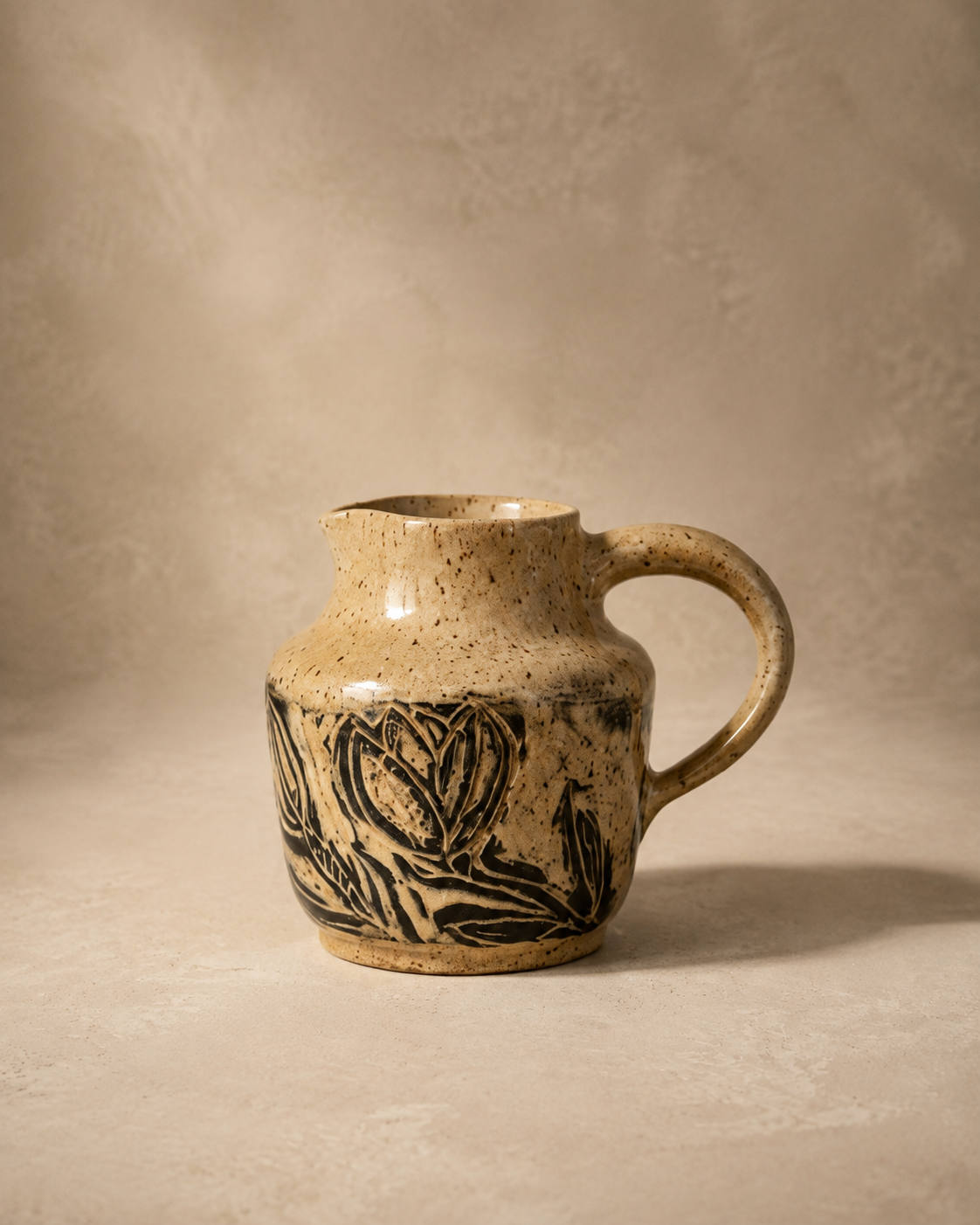 Carved Floral Pitcher
