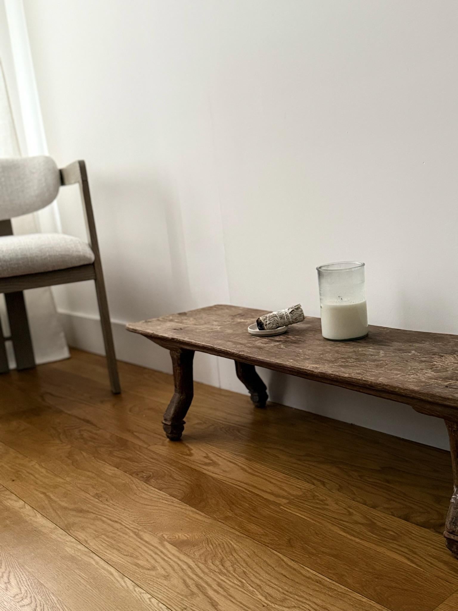 The Carved Teak Floor Table by Andrianna Shamaris
