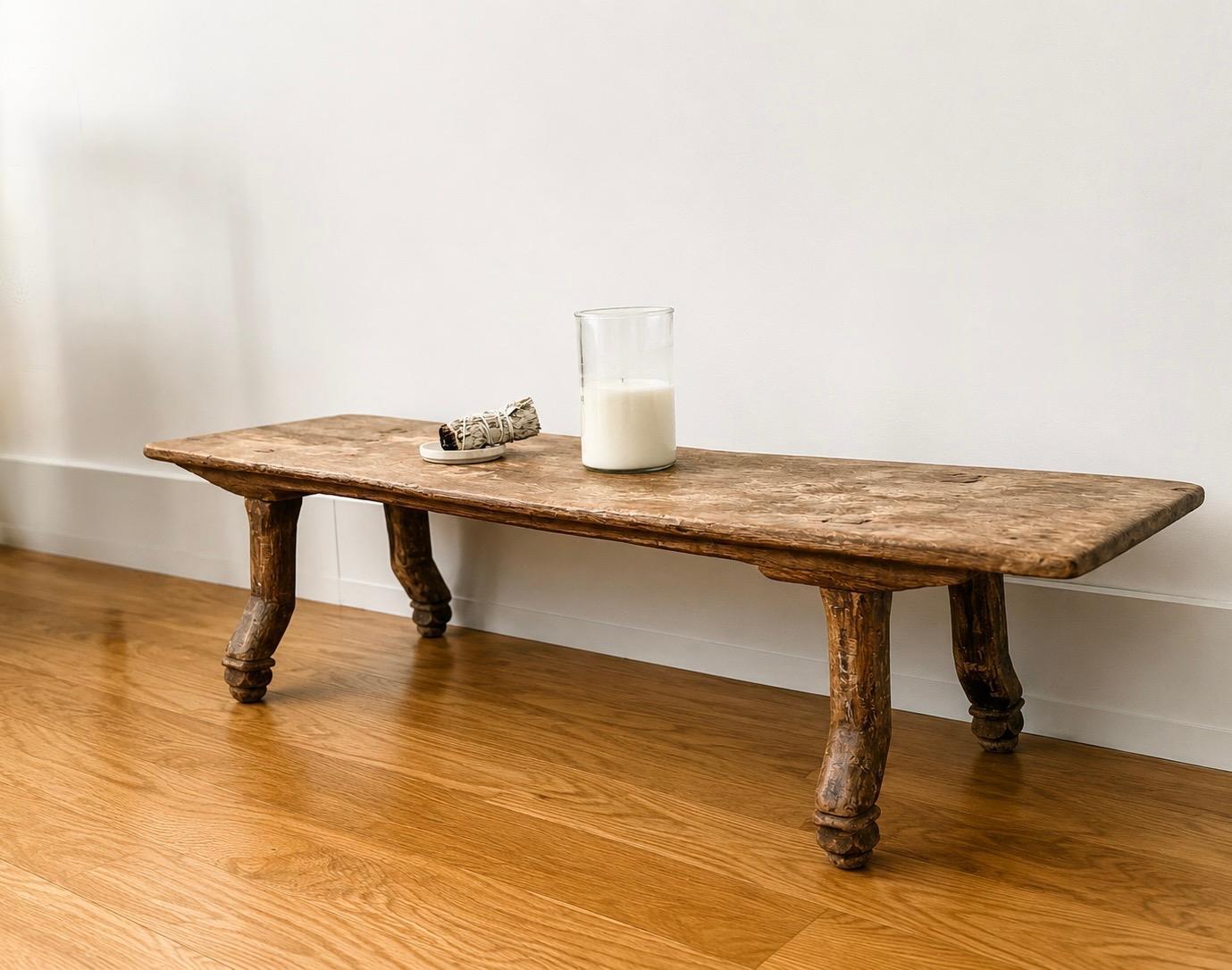 The Carved Teak Floor Table by Andrianna Shamaris