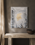 This Moment hung above a stone bench in a warm plaster room