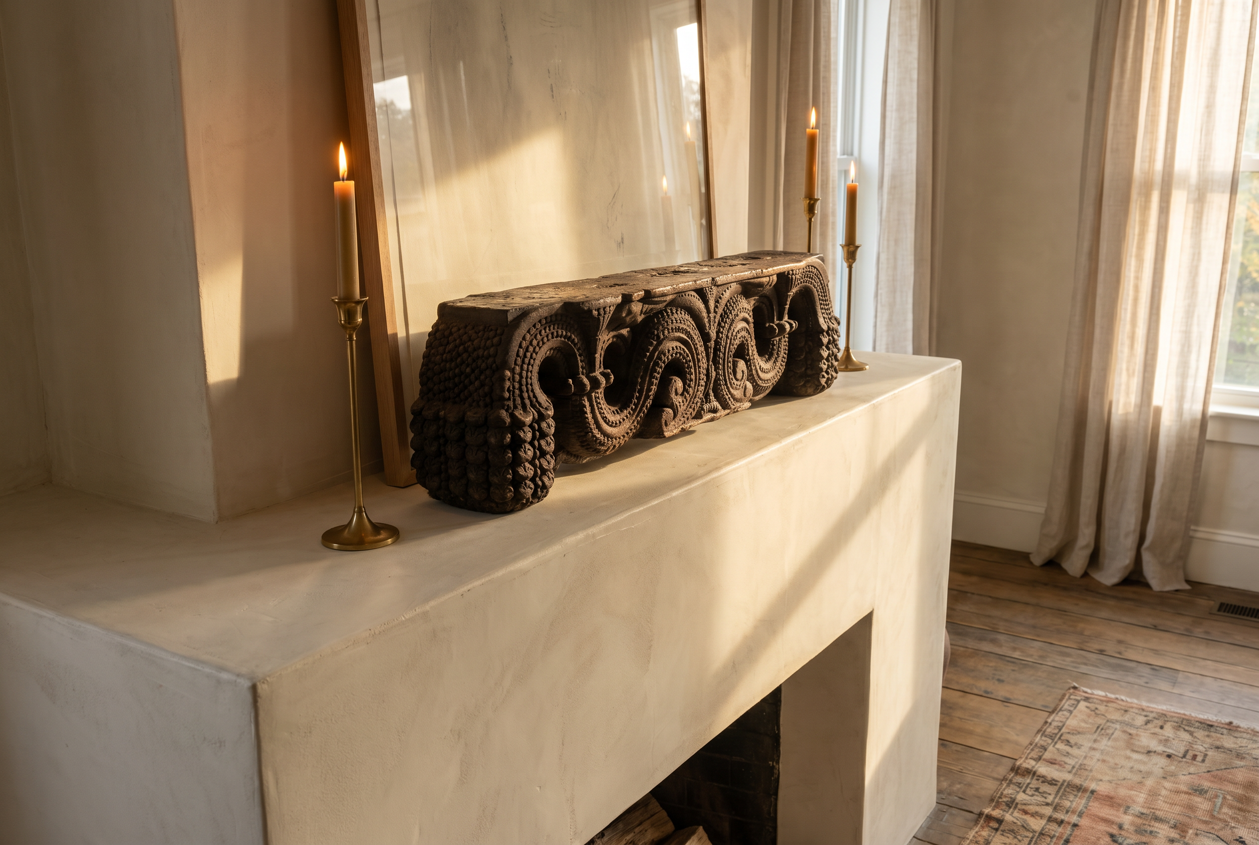 Antique carved wood piece displayed on a fireplace mantel with candlesticks, showing its small scale