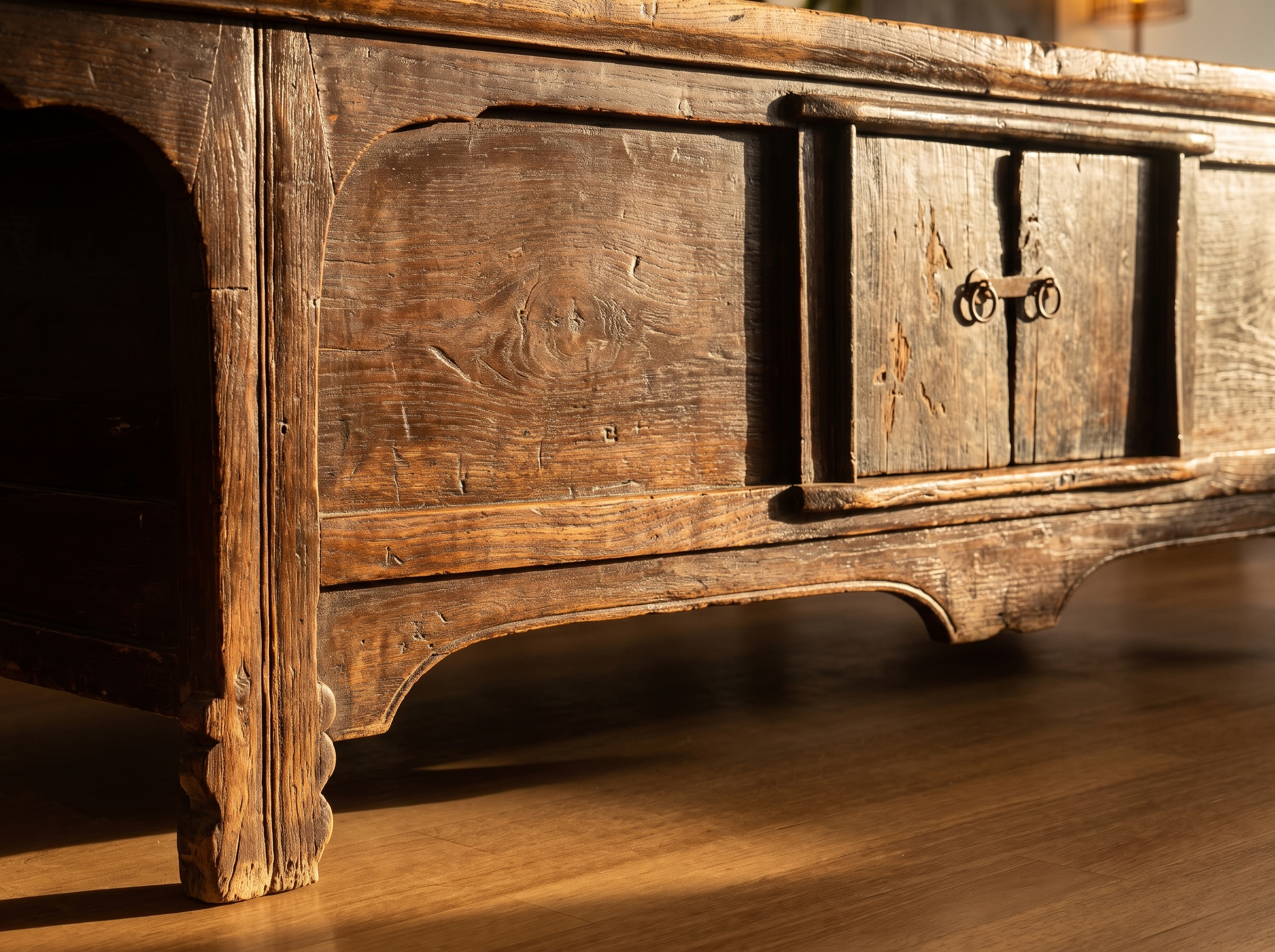 Detail of the central cabinet, metal ring pull, apron and cloud-form foot