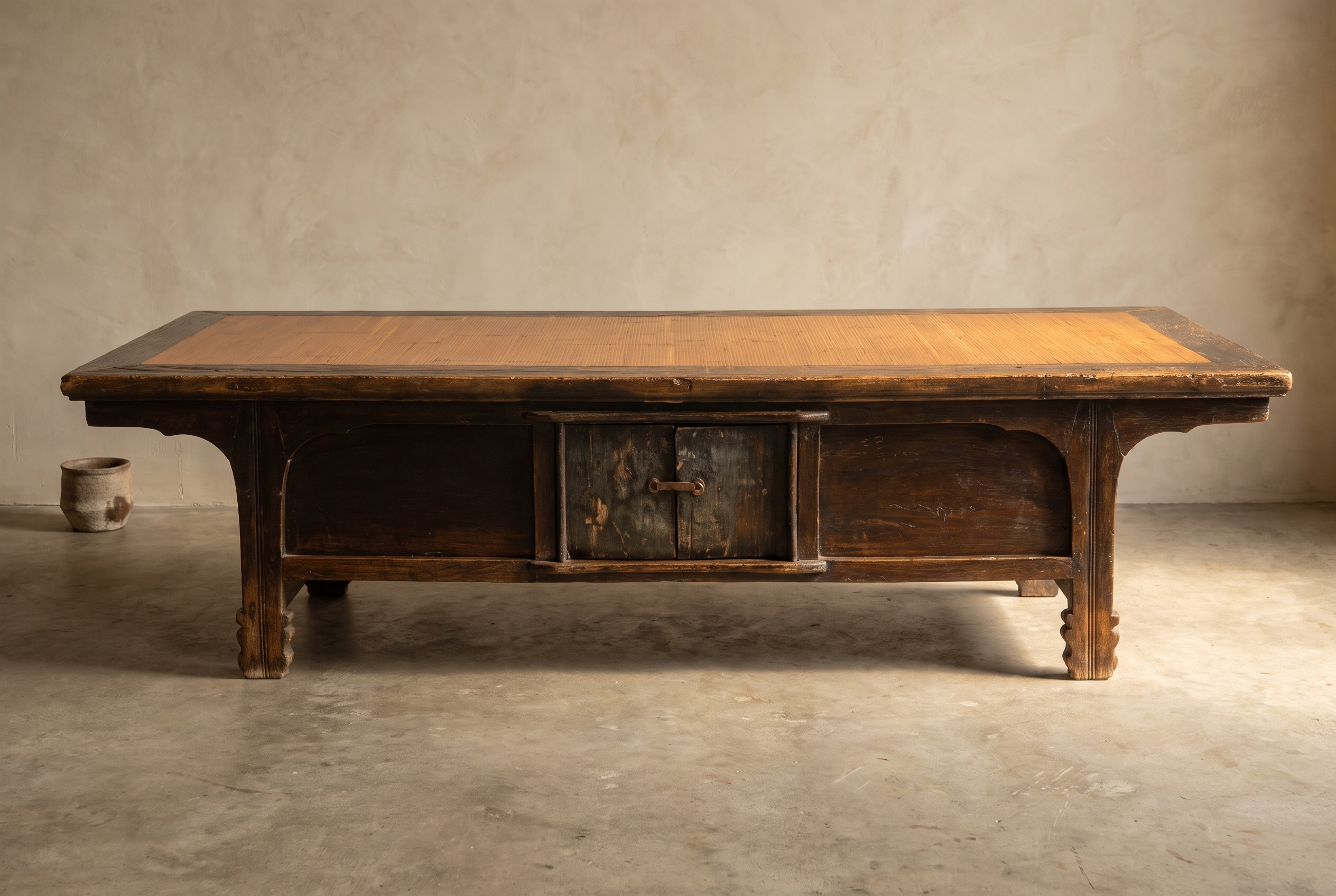 Straight-on studio view of the antique low table