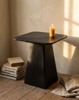 Ember Side Table three-quarter view showing the tapered pedestal base