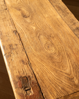 Macro of the weathered honey elm grain along the length of the tabletop