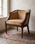 Three-quarter view of the vintage barrel chair