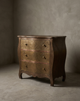 The Saffron Chest Dresser, 45 degree three-quarter view showing the bombe silhouette and cabriole legs