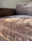 Macro detail of smoked lilac crushed velvet texture and natural wear patina