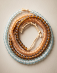 African recycled glass beads, mixed assortment - aqua, peach and smoky amber strands