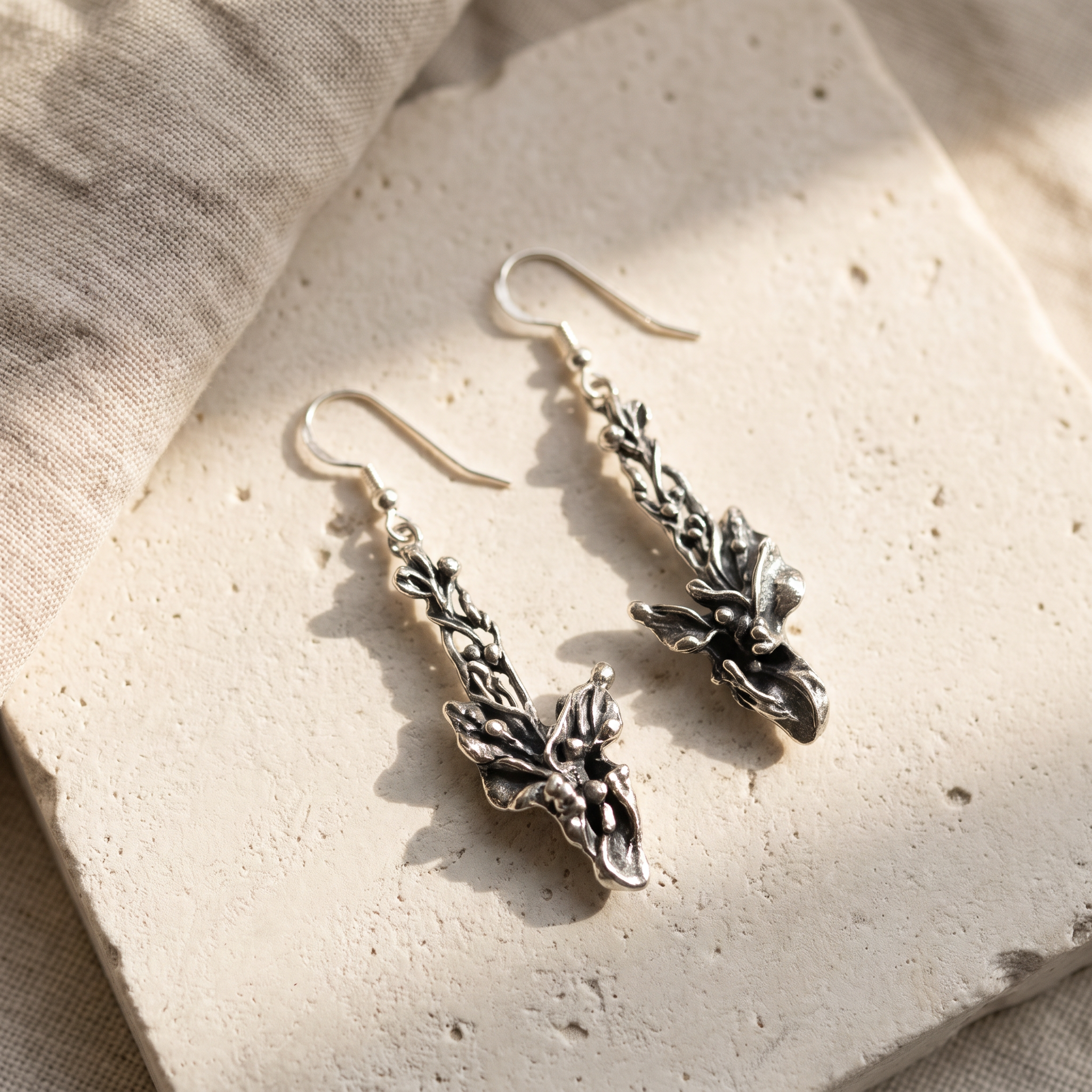 Silver Blossom Drop Earrings by Jacques, oxidised sterling botanical sprig drops on travertine