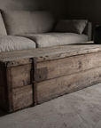 Antique pine trunk as a coffee table, low angle along its length