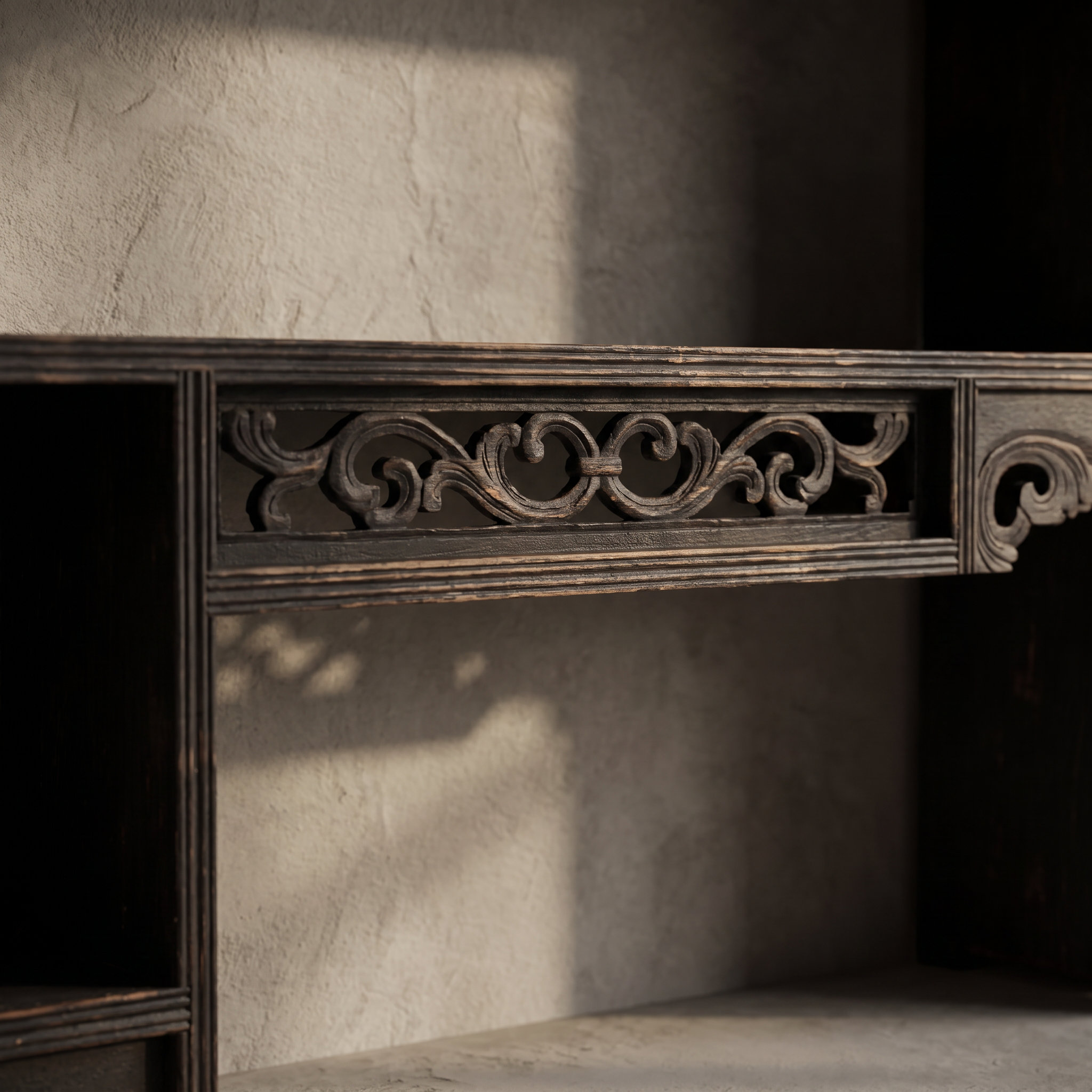Macro detail of pierced fretwork rail between center cubbies