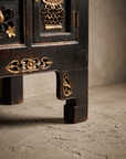 Second detail angle of the console's corner block foot and apron carving