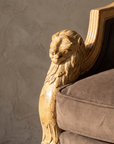 Detail of carved dog head arm terminal